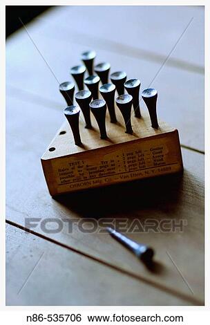Stock Photograph - Vintage game with pegs. Fotosearch