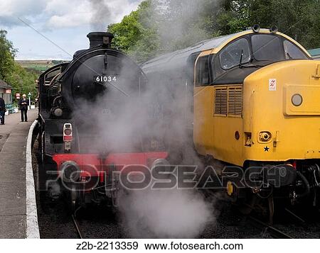 Vintage steam and diesel engines or locomotives at Grosmont station, North Yorkshire Moors Railway, on the North Yorkshire Moors, Yorkshire, UK. View Large Photo Image Stock Photo - Vintage steam and diesel engines or locomotives at Grosmont station, North Yorkshire Moors Railway, on the North Yorkshire Moors, Yorkshire, UK.. Fotosearch