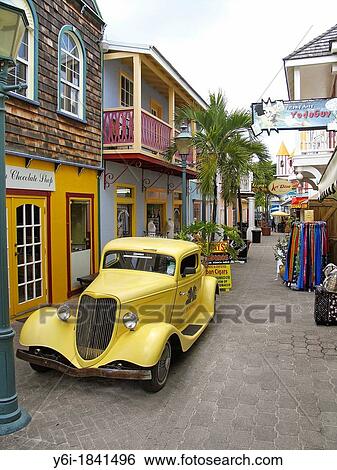 Vintage vehicle and boutiques Old Street shopping St Maarten View Large Photo Image Stock Photograph - Vintage vehicle and boutiques Old Street shopping St Maarten. Fotosearch