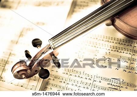 Picture - violin and score. Fotosearch