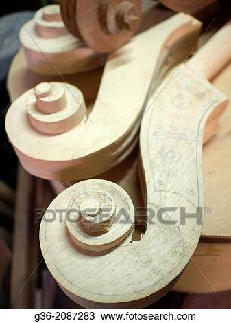Violin assembly in a workshop in Dovadola, Forl? -Cesena, Italy. View Large Photo Image Stock Image - Violin assembly in a workshop in Dovadola, Forl? -Cesena, Italy.. Fotosearch