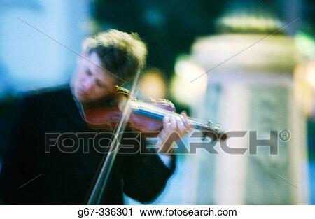 Violinist in Gendarmenmarkt. Berlin. Germany. View Large Photo Image Stock Image - Violinist in Gendarmenmarkt. Berlin. Germany.. Fotosearch