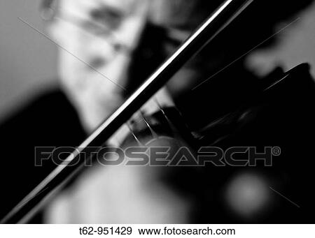 Violinist playing music Violin Black and white View Large Photo Image Stock Photo - Violinist playing music Violin Black and white. Fotosearch