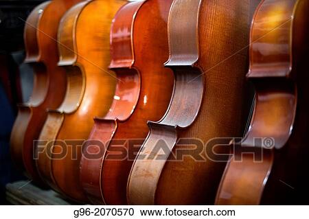 Violoncellos at luthier workshop. View Large Photo Image Stock Image - Violoncellos at luthier workshop.. Fotosearch
