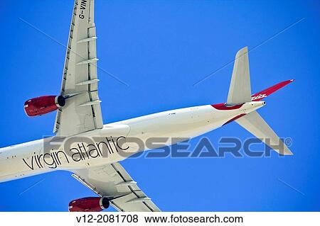 Virgin atlantic taking fly from dubai airport View Large Photo Image Stock Photo - Virgin atlantic taking fly from dubai airport. Fotosearch