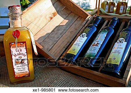 Stock Image - Virgin olive oil kit bottles.. Fotosearch