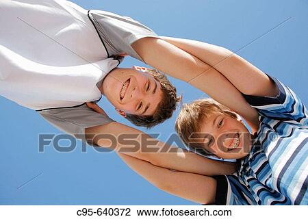 Virginia Beach, Virginia, USA, 2 boys playing on the beach, 13 years old. View Large Photo Image Stock Image - Virginia Beach, Virginia, USA, 2 boys playing on the beach, 13 years old.. Fotosearch