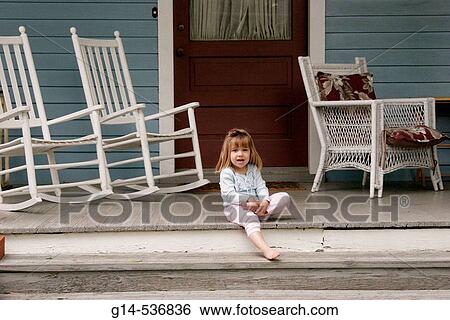 Stock Photograph - Virginia, Round Hill, rocking chairs, porch, girl,. Fotosearch