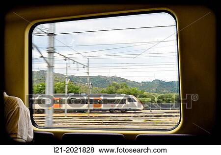 Vision of a moving train through a window. Barcelona province, Catalonia, Spain. View Large Photo Image Stock Photo - Vision of a moving train through a window. Barcelona province, Catalonia, Spain.. Fotosearch