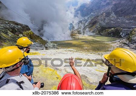 Visitors at an active andesite stratovolcano on White Island, North Island, New Zealand. View Large Photo Image Stock Photograph - Visitors at an active andesite stratovolcano on White Island, North Island, New Zealand.. Fotosearch