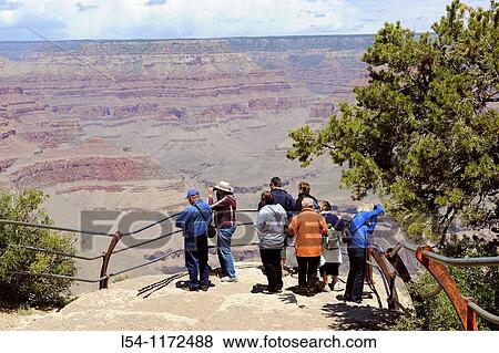 Visitors at South Rim Grand Canyon National Park Arizona View Large Photo Image Stock Photo - Visitors at South Rim Grand Canyon National Park Arizona. Fotosearch