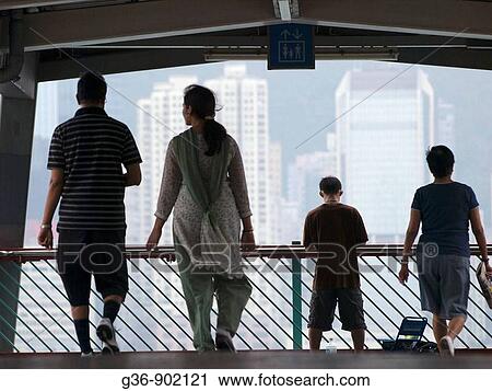 Visitors view harbor in Hong Kong, China View Large Photo Image Stock Image - Visitors view harbor in Hong Kong, China. Fotosearch