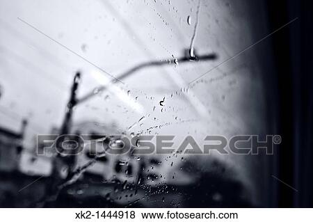 vista nostBlgica de gotas de lluvia en la ventana de un tren View Large Photo Image Stock Photo - vista nostBlgica de gotas de lluvia en la ventana de un tren. Fotosearch