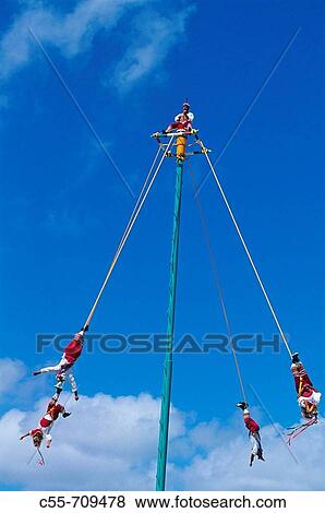 ? Voladores? (flyers) perform Totonac Native ritual outside of Tulum. Yucatan, Mexico View Large Photo Image Stock Photo - ? Voladores? (flyers) perform Totonac Native ritual outside of Tulum. Yucatan, Mexico. Fotosearch