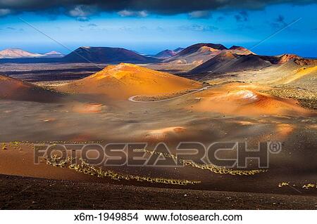 Volcanic landscape. Timanfaya National Park. Lanzarote, Canary Islands, Atlantic Ocean, Spain. View Large Photo Image Picture - Volcanic landscape. Timanfaya National Park. Lanzarote, Canary Islands, Atlantic Ocean, Spain.. Fotosearch