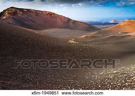 Stock Image - Volcanic landscape. Timanfaya National Park. Lanzarote, Canary Islands, Atlantic Ocean, Spain.. Fotosearch