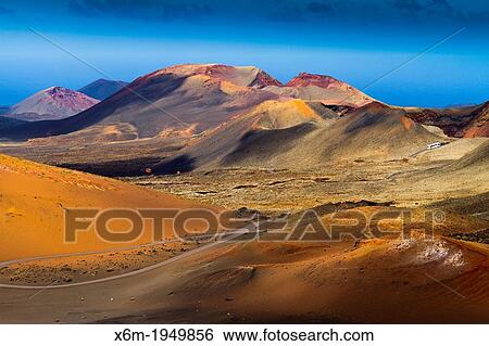 Stock Photograph - Volcanic landscape. Timanfaya National Park. Lanzarote, Canary Islands, Atlantic Ocean, Spain.. Fotosearch