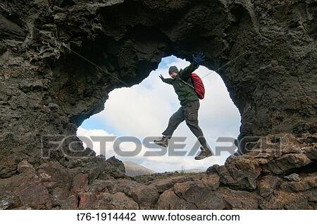 Stock Image - Volcanic rock formations from lava tubes at Dimmuborgir on Lake Myvatn, Iceland. Fotosearch