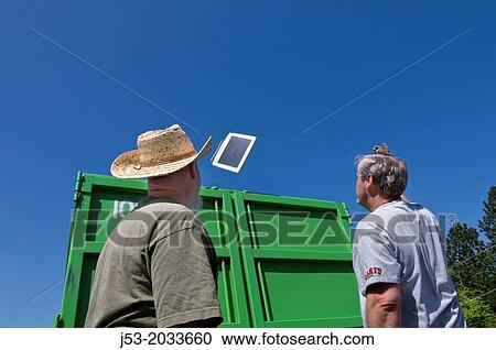 Volunteers throw old monitor into dumpster during community e-waste collection fundraiser in Grass Valley California View Large Photo Image Stock Image - Volunteers throw old monitor into dumpster during community e-waste collection fundraiser in Grass Valley California. Fotosearch