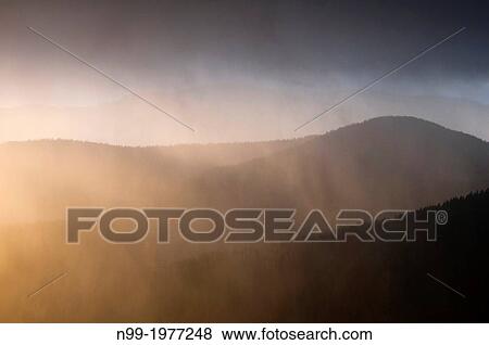 Stock Photo - Vosges, Col de la Schlucht, rain and sun, Alsace, France.. Fotosearch