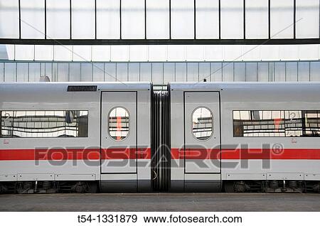 Stock Photo - Wagon compartments of the ICE high speed train in Stuttgart Central Station. Fotosearch
