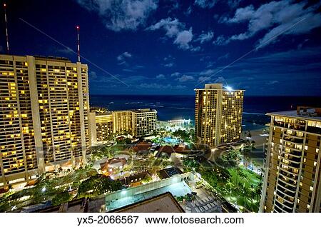 Waikiki tourist area at night, Honolulu, Hawaii. View Large Photo Image Stock Photo - Waikiki tourist area at night, Honolulu, Hawaii.. Fotosearch