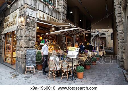 Waiter and Clients in Bar Borsa, Via Roma, Florence; Italy. View Large Photo Image Stock Image - Waiter and Clients in Bar Borsa, Via Roma, Florence; Italy.. Fotosearch