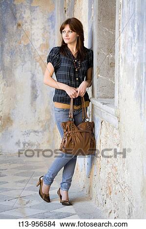 Waiting in a corridor young woman View Large Photo Image Picture - Waiting in a corridor young woman. Fotosearch