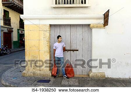Waiting Man Old City Cartagena Colombia SA South America Caribbean View Large Photo Image Stock Image - Waiting Man Old City Cartagena Colombia SA South America Caribbean. Fotosearch