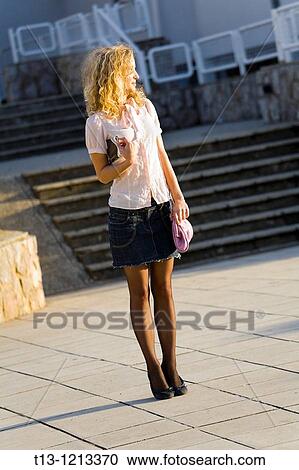 Stock Image - Waiting young lady. Fotosearch