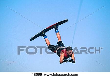 Stock Photo - Wakeboarding, a big jump. Fotosearch