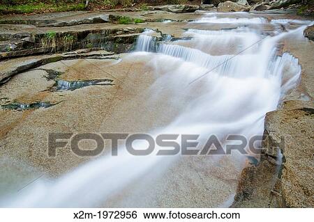 Walker Cascades during the spring months. These cascades are located along Walker Brook in Franconia Notch State Park of the White Mountain National Forest, New Hampshire. View Large Photo Image Stock Photograph - Walker Cascades during the spring months. These cascades are located along Walker Brook in Franconia Notch State Park of the White Mountain National Forest, New Hampshire.. Fotosearch