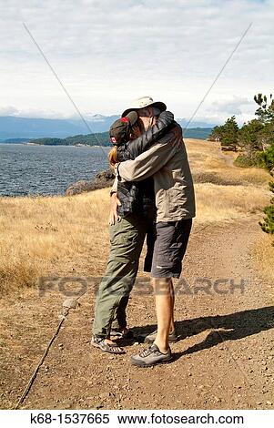 Stock Photography - walkers at Helliwell Park, Hornby Island, Gulf Islands, BC, Canada. Fotosearch