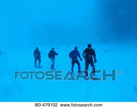Walking in a frozen lagoon. Sierra de Neila. Burgos province. Spain. View Large Photo Image Stock Image - Walking in a frozen lagoon. Sierra de Neila. Burgos province. Spain.. Fotosearch