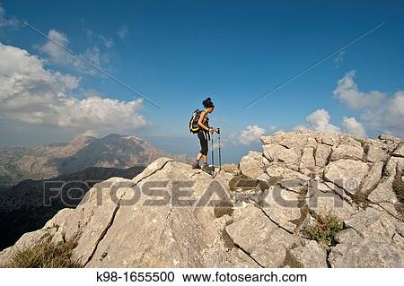 walking in the Puig de Massanella, 1365 meters Escorca Township Sierra de Tramuntana Mallorca Spain Balearic Islands View Large Photo Image Stock Image - walking in the Puig de Massanella, 1365 meters Escorca Township Sierra de Tramuntana Mallorca Spain Balearic Islands. Fotosearch