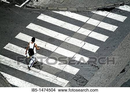 Walking through the pedestrian crossing View Large Photo Image Picture - Walking through the pedestrian crossing. Fotosearch