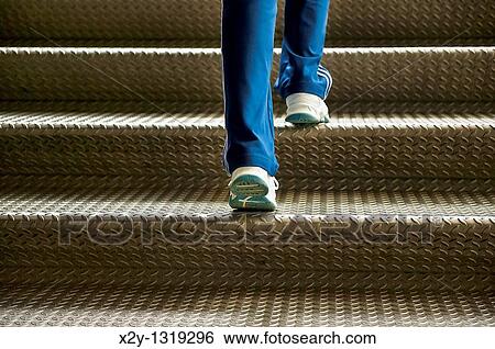 Walking up steps View Large Photo Image Stock Photograph - Walking up steps. Fotosearch
