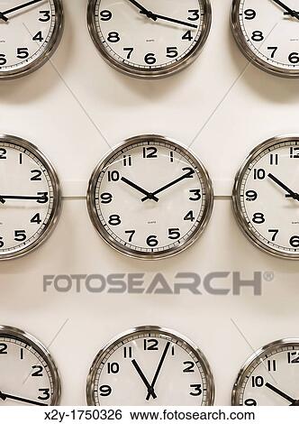 Stock Photograph - Wall clock display. Fotosearch