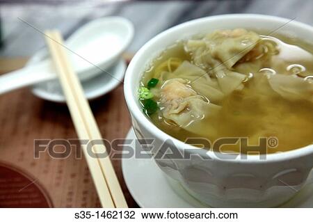 Wanton noodles served in a local restaurant, Macau, China View Large Photo Image Stock Image - Wanton noodles served in a local restaurant, Macau, China. Fotosearch
