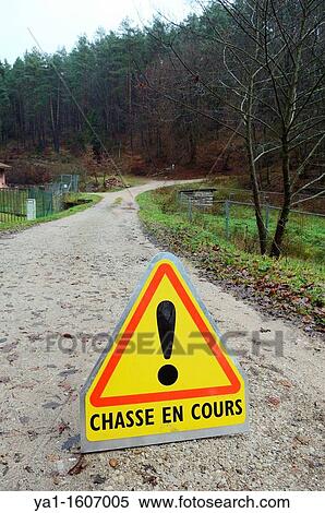 Warning sign of hunting game battue in forest, Baerenthal, Parc naturel des Vosges du Nord, Moselle, France View Large Photo Image Stock Photography - Warning sign of hunting game battue in forest, Baerenthal, Parc naturel des Vosges du Nord, Moselle, France. Fotosearch