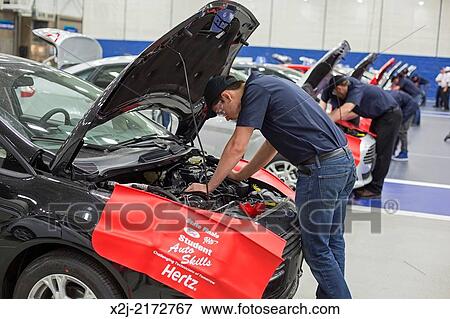 Warren, Michigan - High school students participate in an auto repair skills competition. Ten teams competed to find and repair intentionally installed problems in identical Ford Fiestas. The competition is sponsored by Ford and AAA. View Large Photo Image Stock Photo - Warren, Michigan - High school students participate in an auto repair skills competition. Ten teams competed to find and repair intentionally installed problems in identical Ford Fiestas. The competition is sponsored by Ford and AAA.. Fotosearch