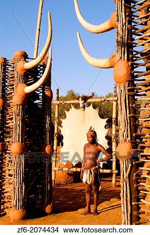 Warrior at Entrance of Native Zulu Tribe at Shakaland Center South Africa. View Large Photo Image Picture - Warrior at Entrance of Native Zulu Tribe at Shakaland Center South Africa.. Fotosearch