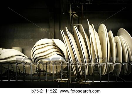 Washing up in a restaurant kitchen. London, England, UK, Europe. View Large Photo Image Stock Image - Washing up in a restaurant kitchen. London, England, UK, Europe.. Fotosearch