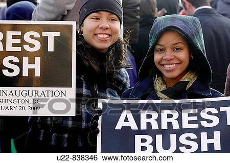 Washington D C USA, girls showing anti-president Bush signs on 20th January 2009 at president Barack Obama swearing-in-ceremony View Large Photo Image Stock Photograph - Washington D C USA, girls showing anti-president Bush signs on 20th January 2009 at president Barack Obama swearing-in-ceremony. Fotosearch
