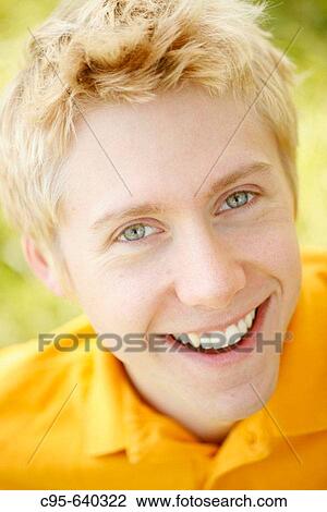 Washington, DC, USA, Portrait of a young man, with cell phone, volleyball and tennis, Adult, 23 years old View Large Photo Image Stock Image - Washington, DC, USA, Portrait of a young man, with cell phone, volleyball and tennis, Adult, 23 years old. Fotosearch