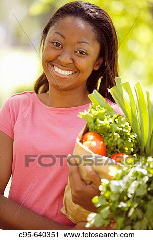 Washington, DC, USA, Portrait of a woman on the market, book and drug stores, African American, Adult, 30 years old. View Large Photo Image Stock Image - Washington, DC, USA, Portrait of a woman on the market, book and drug stores, African American, Adult, 30 years old.. Fotosearch