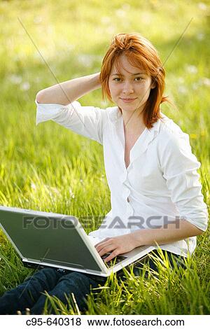 Washington, DC, USA, Portrait of a woman, with cell phone and laptop, Adult, 23 years old, Asian View Large Photo Image Stock Photo - Washington, DC, USA, Portrait of a woman, with cell phone and laptop, Adult, 23 years old, Asian. Fotosearch