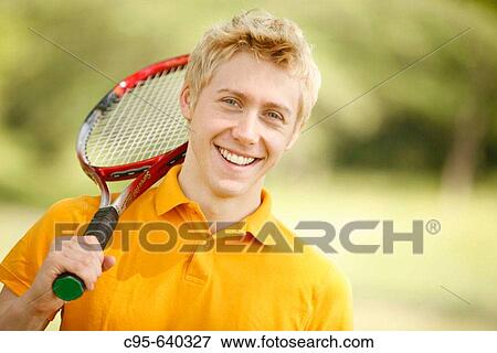 Washington, DC, USA, Portrait of a young man, with cell phone, volleyball and tennis, Adult, 23 years old. View Large Photo Image Stock Photo - Washington, DC, USA, Portrait of a young man, with cell phone, volleyball and tennis, Adult, 23 years old.. Fotosearch