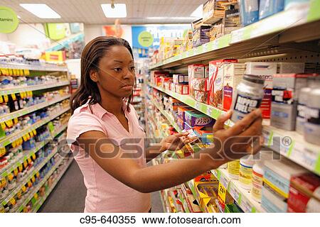 Washington, DC, USA, Portrait of a woman on the market, book and drug stores, African American, Adult, 30 years old. View Large Photo Image Stock Photography - Washington, DC, USA, Portrait of a woman on the market, book and drug stores, African American, Adult, 30 years old.. Fotosearch