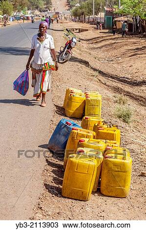 Water Containers In The Street, Karat Konso, Ethiopia. View Large Photo Image Stock Image - Water Containers In The Street, Karat Konso, Ethiopia.. Fotosearch
